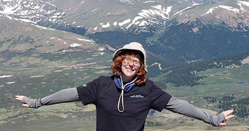 Sam Betts overlooking mountain range